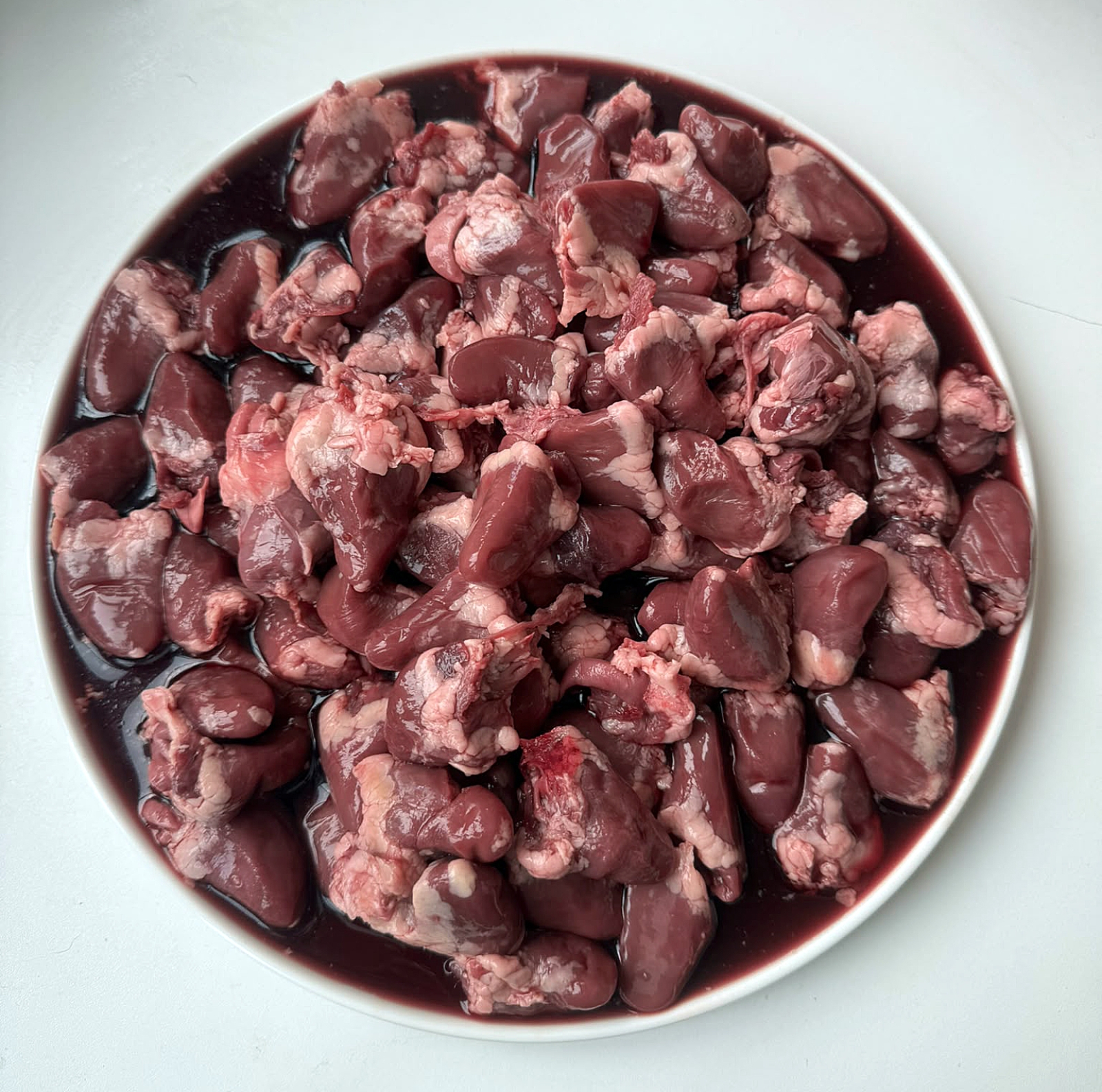 Vlees voor B.A.R.F. - Kippenhartjes (diepgevroren) Yoggies
